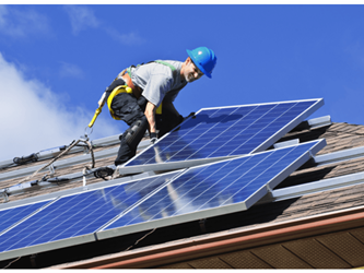 Man working on solar panels