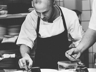 man fixing food 