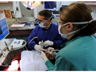 Dentists working on a patient