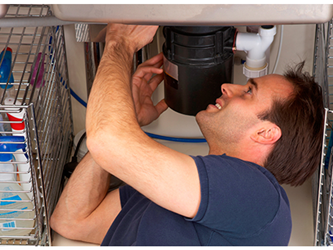 Man fixing a sink