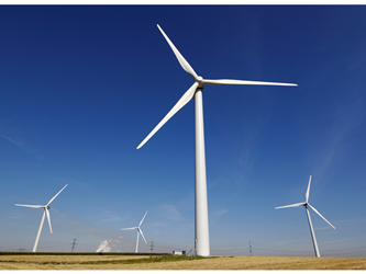 Windmills turning in a field